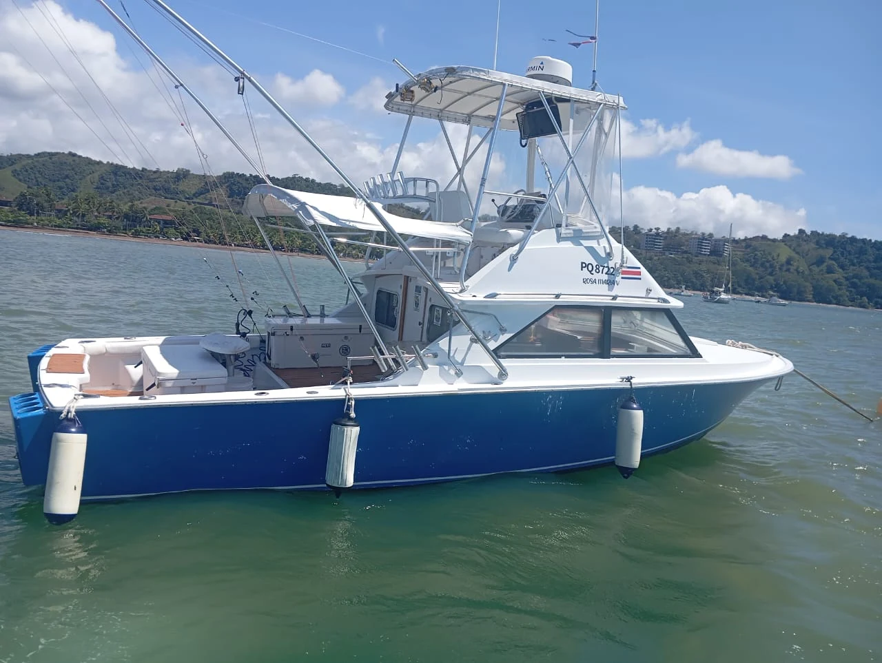30' Bertram Sportfish fishing boat at Herradura Beach Costa Rica