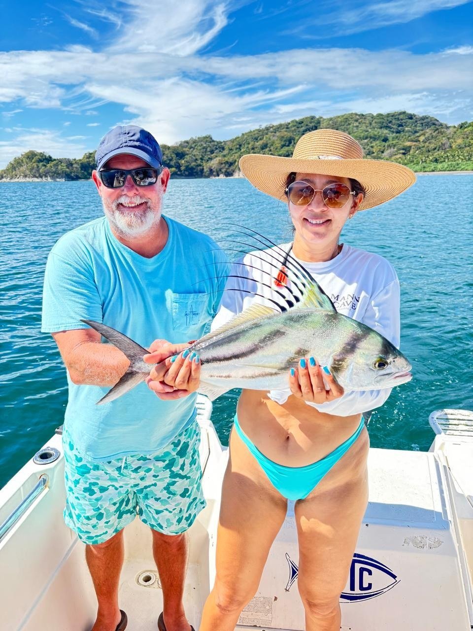 Roosterfish Catch Jaco Costa Rica 1 Guest with roosterfish during a Wahoo Sportfishing Jaco inshore fishing charter in Costa Rica