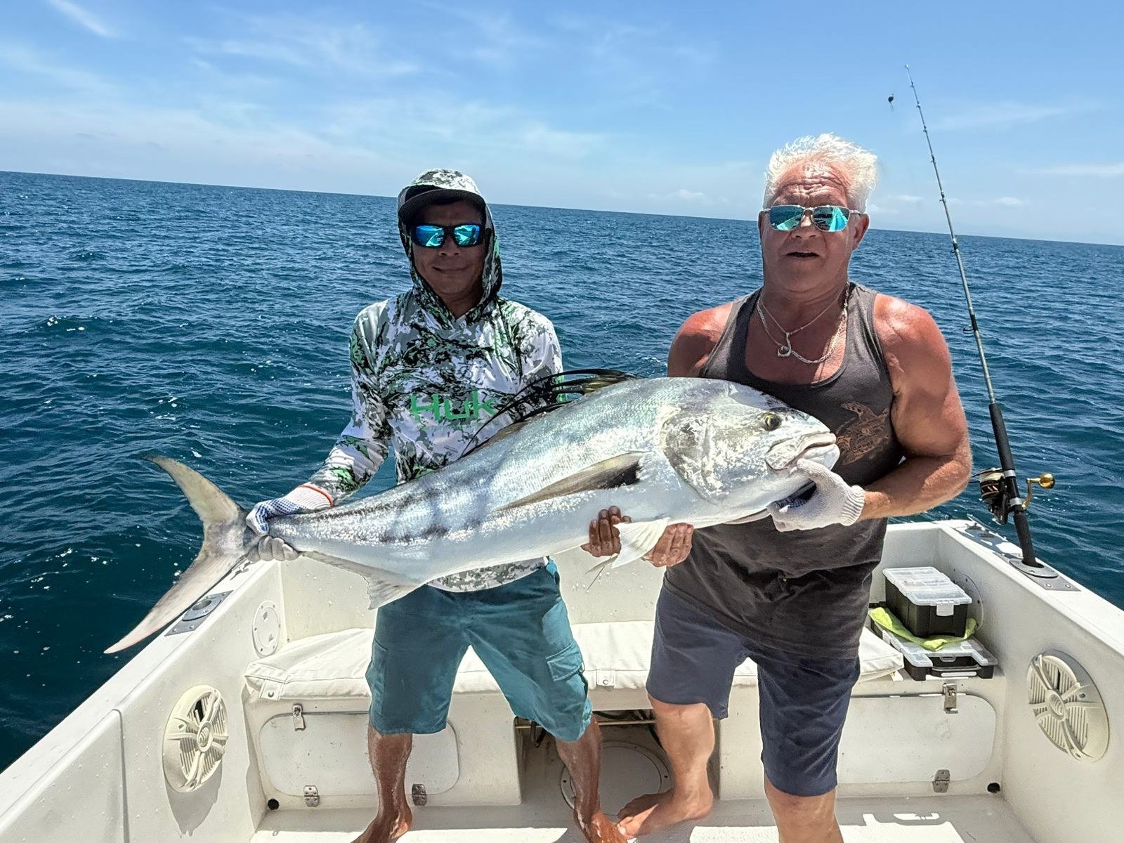 Roosterfish Catch Jaco Costa Rica 3 Guest with roosterfish during a Wahoo Sportfishing Jaco inshore fishing charter in Costa Rica