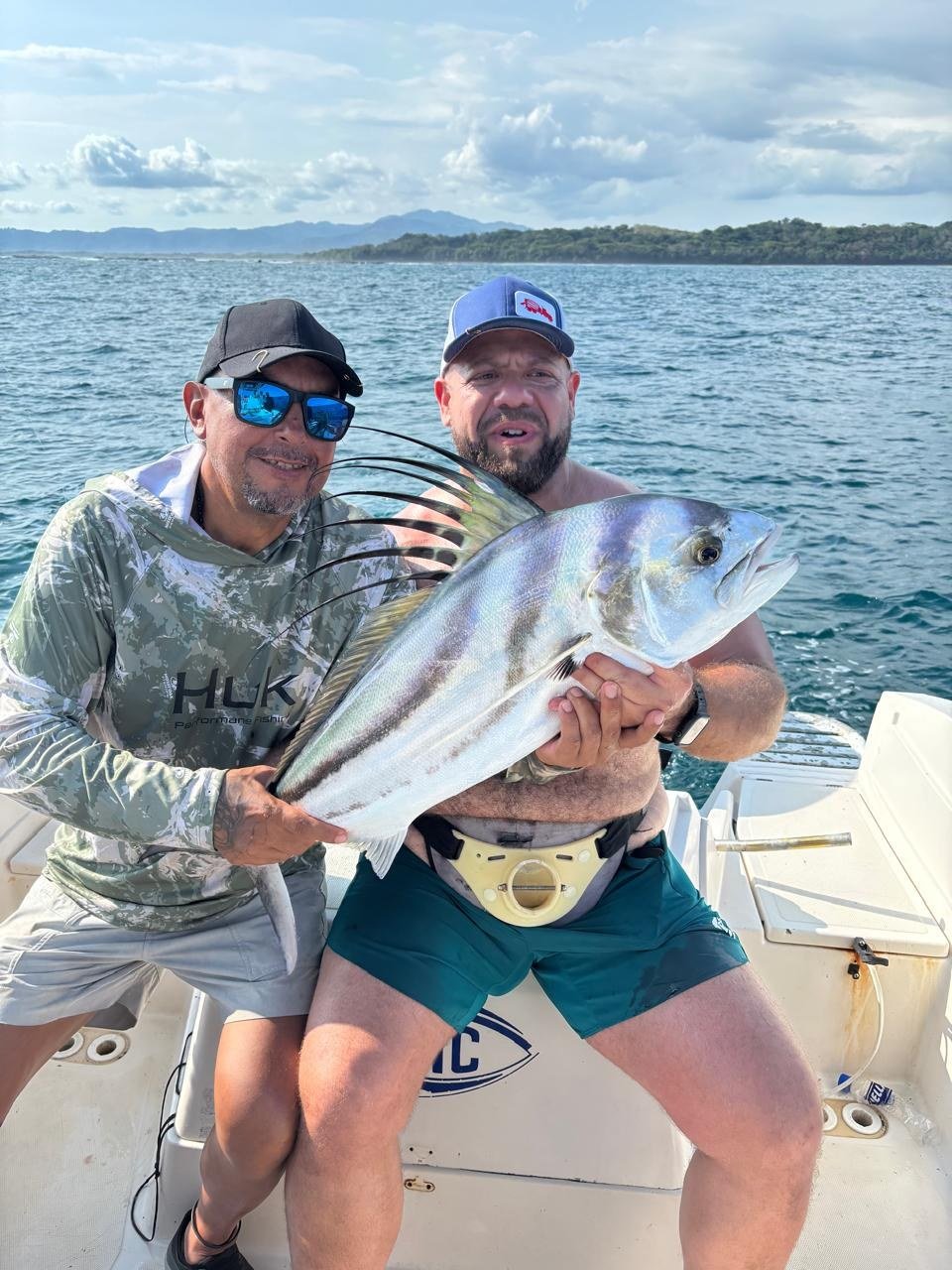 Roosterfish Catch Jaco Costa Rica 7 Guest with roosterfish during a Wahoo Sportfishing Jaco inshore fishing charter in Costa Rica