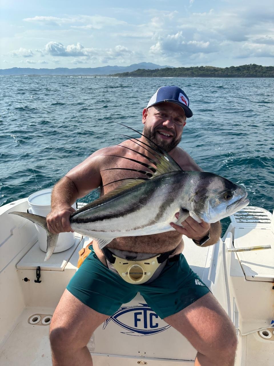 Guest with roosterfish during a Wahoo Sportfishing Jaco inshore fishing charter in Costa Rica